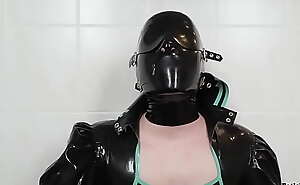 Spitting fun with latex mask and costume - Saliva mess on shiny rubber clothing (TRAILER)