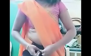 Swathi naidu sexy added to romantic dotard in orange saree