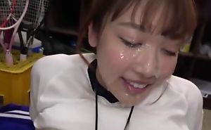 Sporty Japanese girl gets her whole face covered in rife with cum