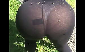 Flashing big ass Tanga in transparent leggins bbw Milf in the garden