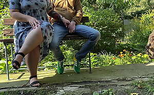 Stepmom jerks off stepson's cock outdoors in the park