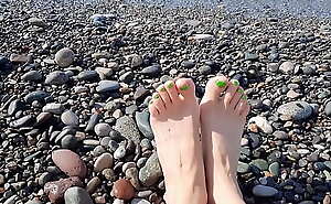 Sea-salted feet and toes of Dominatrix Nika. Lick her toes