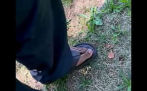Male feet in the park