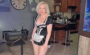 Naughty disobedient French maid MILF strip teasing as she dances in the living room
