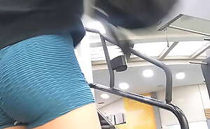 Hottie working out in blue spandex shorts