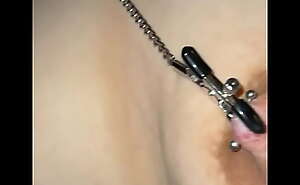 Pierced little slut with nipple clamps
