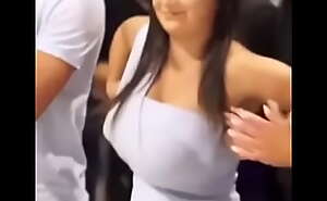 Gorgeous woman dancing with her huge tits and tight dress