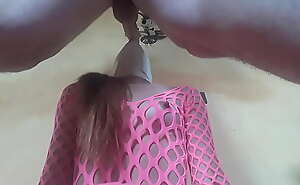 Wearing pink fishnet catsuit and pink platform ankle boots. Rough  blowjob