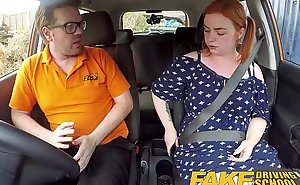 Fake Driving Tutor Voluptuous redhead copulates in car