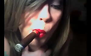 BBW Mistress Tina Snua Smokes A Cigar Using A Holder