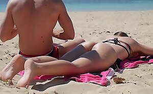 Mia Natalia takes a cumshoot on a public beach from Western guy